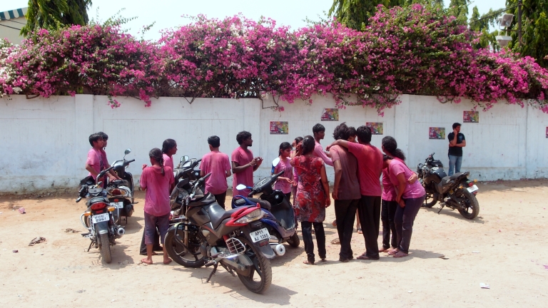 Groups of local people celebrating on Hyderabad streets